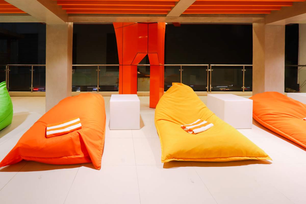 Orange and yellow loungers on the terrace